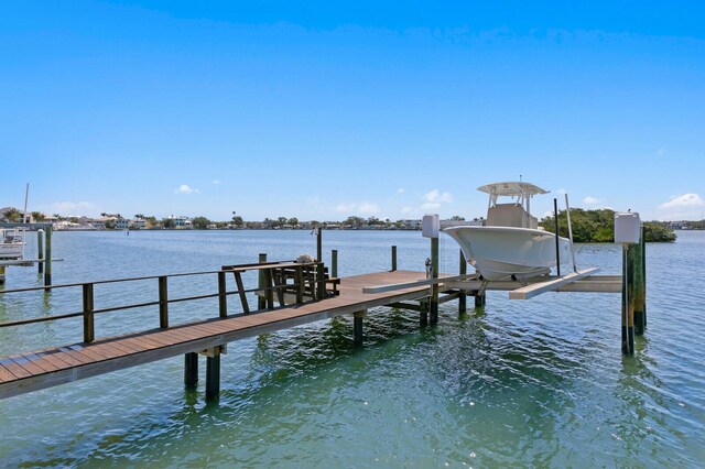 443 18th Ave, Indian Rocks Beach, FL 33785 - dock area with boat lift and a water view