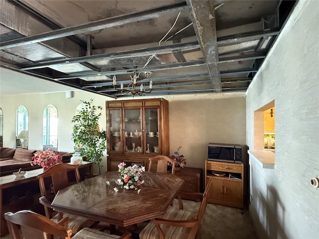 7910 Sun Island Dr S Unit 404, South Pasadena, FL 33707 - dining room with carpet