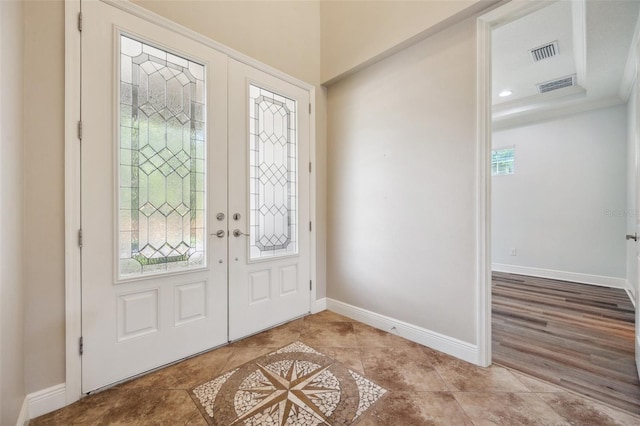 5117 Longspur Ct, Lithia, FL 33547 - foyer entrance with french doors and baseboards