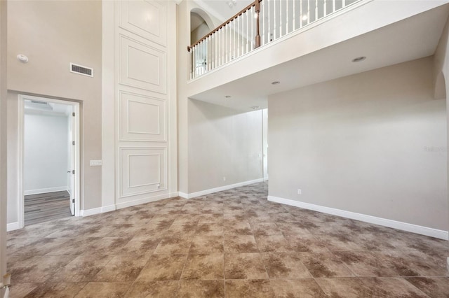 5117 Longspur Ct, Lithia, FL 33547 - unfurnished room featuring a high ceiling and baseboards