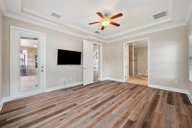 5117 Longspur Ct, Lithia, FL 33547 - unfurnished bedroom with light wood finished floors, ornamental molding, baseboards, ensuite bathroom, and ceiling fan