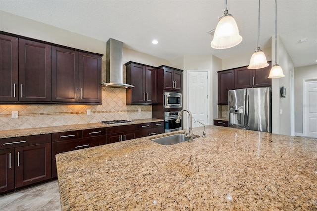 5117 Longspur Ct, Lithia, FL 33547 - kitchen featuring appliances with stainless steel finishes, a sink, wall chimney range hood, and light stone counters