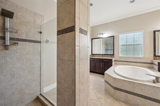 5117 Longspur Ct, Lithia, FL 33547 - bathroom with walk in shower, ornamental molding, a garden tub, tile patterned floors, and vanity