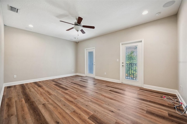 5117 Longspur Ct, Lithia, FL 33547 - unfurnished room with wood finished floors, a ceiling fan, baseboards, recessed lighting, and a smoke detector
