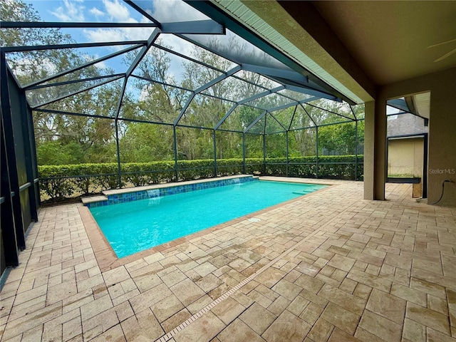 5117 Longspur Ct, Lithia, FL 33547 - outdoor pool featuring a patio and glass enclosure