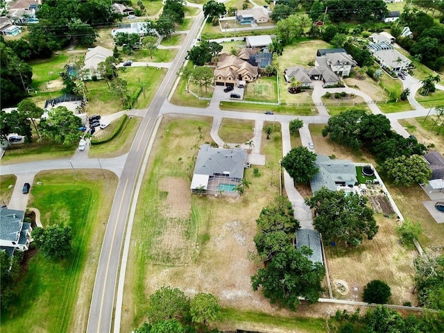 aerial overview of property's location featuring nearby suburban area
