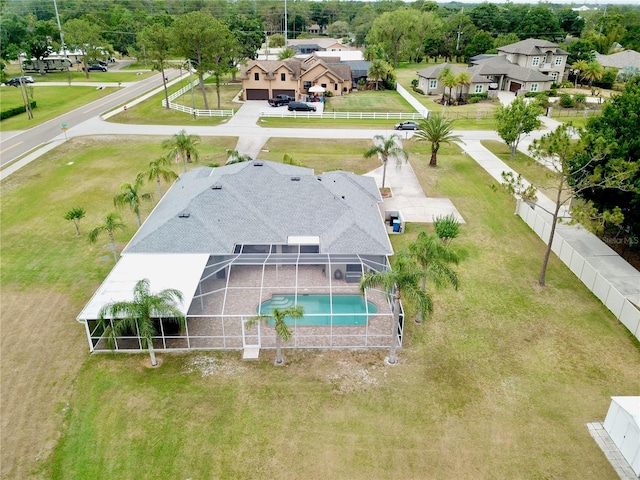aerial perspective of suburban area with a pool area