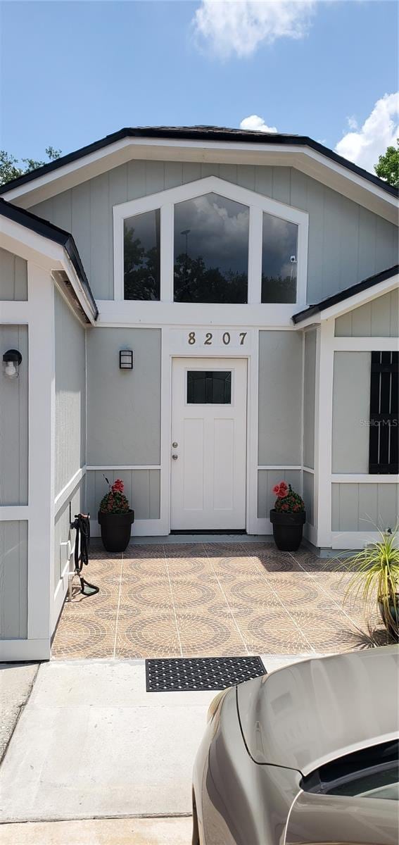 8207 Volusia Pl, Tampa, FL 33637 - doorway to property with a patio