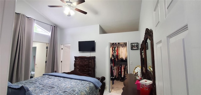 8207 Volusia Pl, Tampa, FL 33637 - bedroom with lofted ceiling, a walk in closet, a closet, marble finish flooring, and a ceiling fan