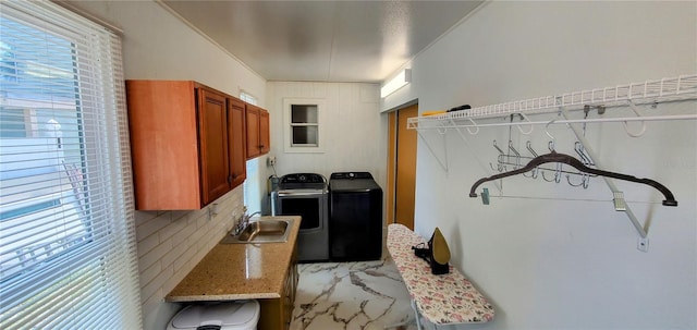 8207 Volusia Pl, Tampa, FL 33637 - washroom with cabinet space and washer and clothes dryer