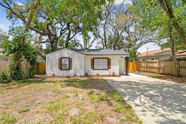 1404 E Curtis St, Tampa, FL 33603 - view of front of house with concrete driveway