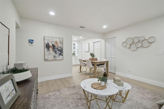 1404 E Curtis St, Tampa, FL 33603 - living room with light wood-type flooring, baseboards, and recessed lighting