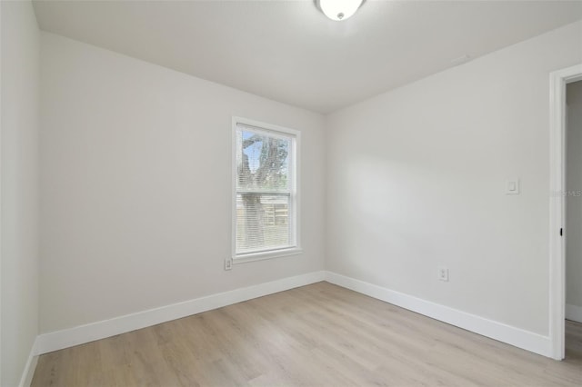 1404 E Curtis St, Tampa, FL 33603 - unfurnished room featuring light wood-type flooring and baseboards