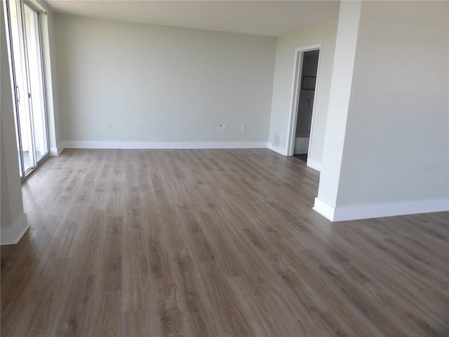 2699 Seville Blvd Unit 802, Clearwater, FL 33764 - spare room with wood finished floors and baseboards