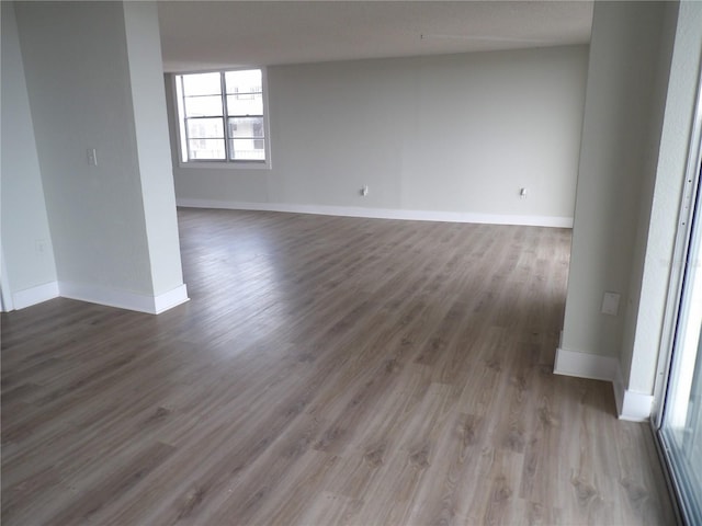 2699 Seville Blvd Unit 802, Clearwater, FL 33764 - unfurnished room with wood finished floors and baseboards