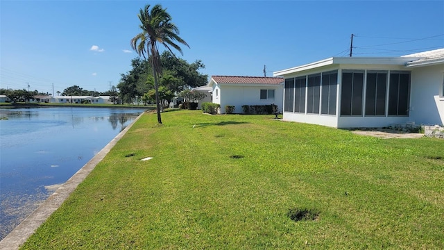 10040 38th Way N, Pinellas Park, FL 33782 - view of grassy yard featuring a sunroom