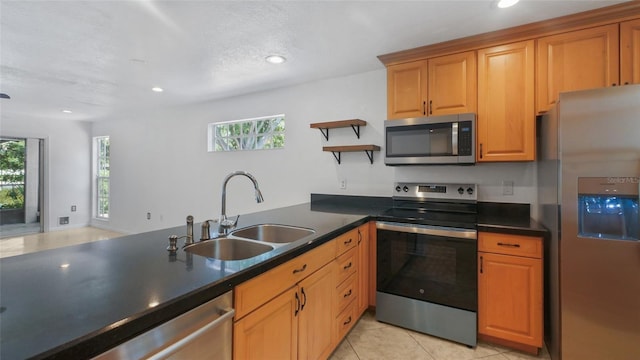 9050 Lake Place Ln, Tampa, FL 33634 - kitchen with stainless steel appliances, a sink, open shelves, dark countertops, and recessed lighting