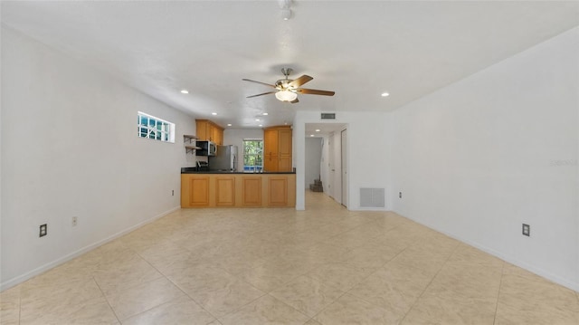 9050 Lake Place Ln, Tampa, FL 33634 - unfurnished living room featuring ceiling fan, recessed lighting, and baseboards