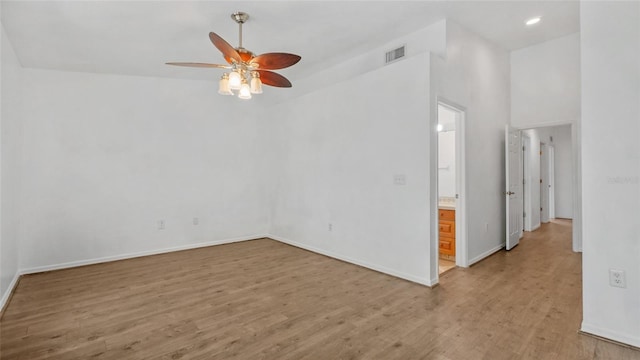 9050 Lake Place Ln, Tampa, FL 33634 - unfurnished room with a ceiling fan, light wood-type flooring, baseboards, and recessed lighting