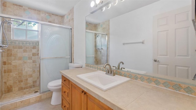9050 Lake Place Ln, Tampa, FL 33634 - full bath featuring a stall shower, toilet, tile patterned floors, and vanity