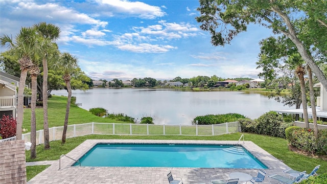9050 Lake Place Ln, Tampa, FL 33634 - view of pool featuring a water view and a patio area