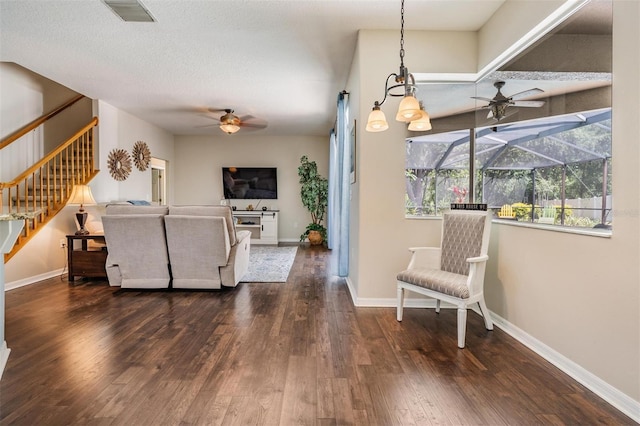 5109 Hartwell Loop, Land O Lakes, FL 34638 - living area featuring a ceiling fan, wood finished floors, stairway, and baseboards