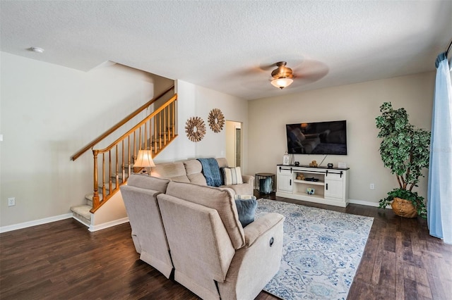 5109 Hartwell Loop, Land O Lakes, FL 34638 - living area featuring stairs, wood finished floors, ceiling fan, a textured ceiling, and baseboards