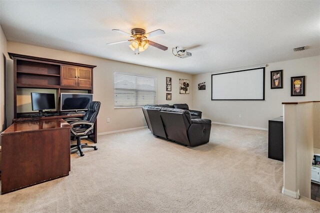 5109 Hartwell Loop, Land O Lakes, FL 34638 - cinema room with a ceiling fan, light carpet, and baseboards