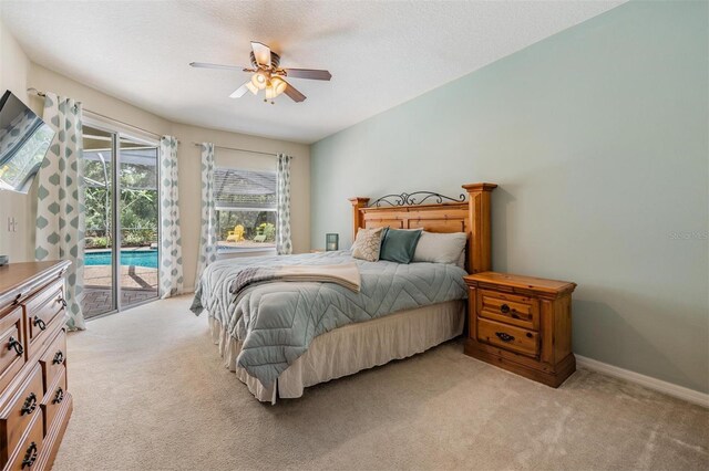 5109 Hartwell Loop, Land O Lakes, FL 34638 - bedroom featuring light colored carpet, access to exterior, ceiling fan, and baseboards