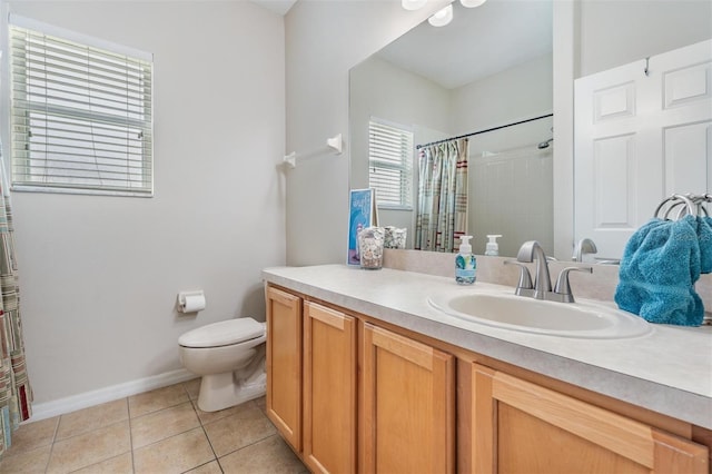 5109 Hartwell Loop, Land O Lakes, FL 34638 - bathroom with toilet, tile patterned flooring, curtained shower, vanity, and baseboards