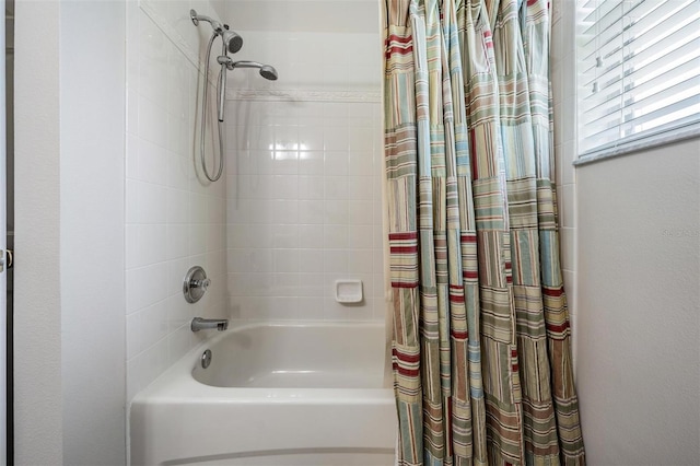 5109 Hartwell Loop, Land O Lakes, FL 34638 - bathroom with shower / bath combo with shower curtain