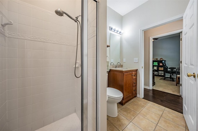 5109 Hartwell Loop, Land O Lakes, FL 34638 - full bath with a stall shower, vanity, tile patterned floors, and toilet