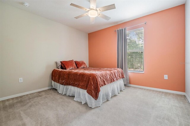 5109 Hartwell Loop, Land O Lakes, FL 34638 - bedroom with carpet, baseboards, and a ceiling fan