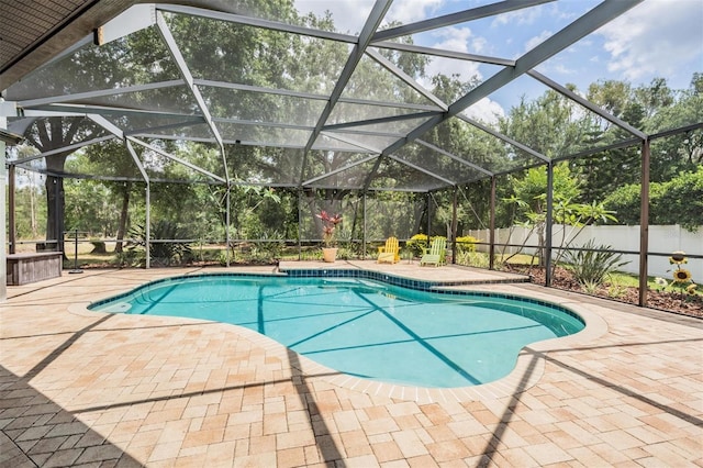 5109 Hartwell Loop, Land O Lakes, FL 34638 - view of pool featuring a patio area, glass enclosure, and fence