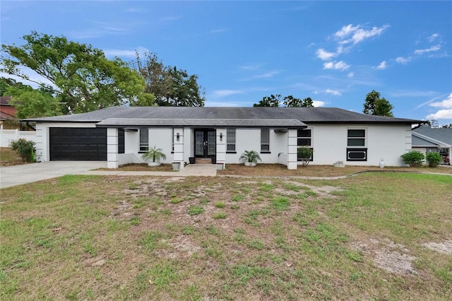 2219 Summit View Dr, Valrico, FL 33596 - single story home with french doors, a garage, stucco siding, driveway, and a front yard