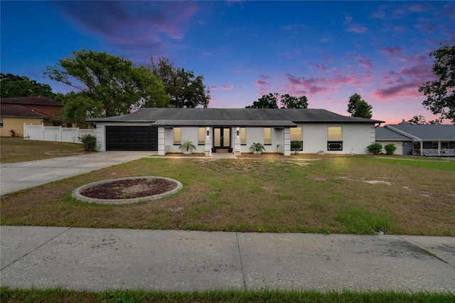 2219 Summit View Dr, Valrico, FL 33596 - ranch-style home with concrete driveway, a garage, and stucco siding