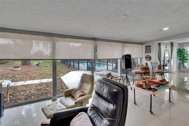 2219 Summit View Dr, Valrico, FL 33596 - living room with a textured ceiling and tile patterned flooring