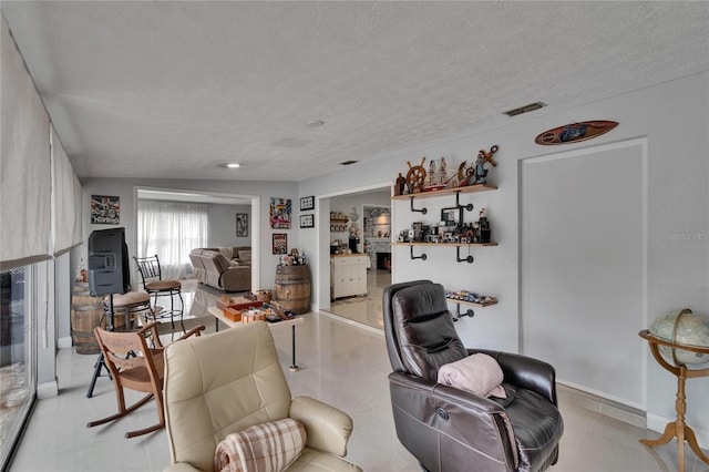 2219 Summit View Dr, Valrico, FL 33596 - living area featuring a textured ceiling