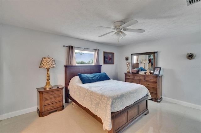 2219 Summit View Dr, Valrico, FL 33596 - bedroom featuring baseboards, ceiling fan, and a textured ceiling