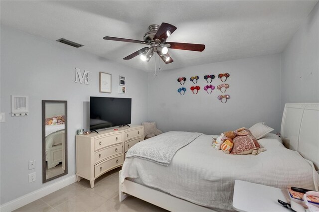 2219 Summit View Dr, Valrico, FL 33596 - bedroom with light tile patterned flooring, baseboards, and a ceiling fan