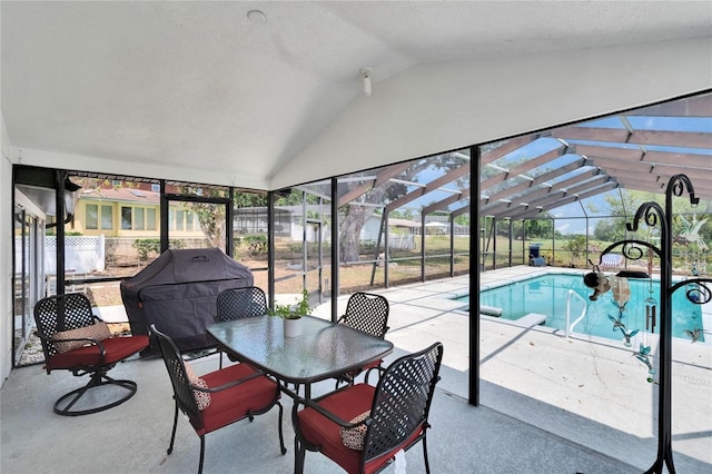 2219 Summit View Dr, Valrico, FL 33596 - sunroom / solarium featuring lofted ceiling, plenty of natural light, outdoor dining space, and a swimming pool