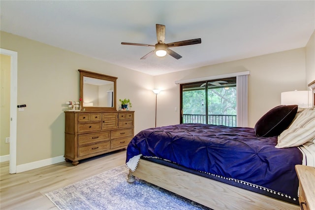 2913 Fig Ct, Palm Harbor, FL 34684 - bedroom featuring access to outside, wood finished floors, ceiling fan, and baseboards