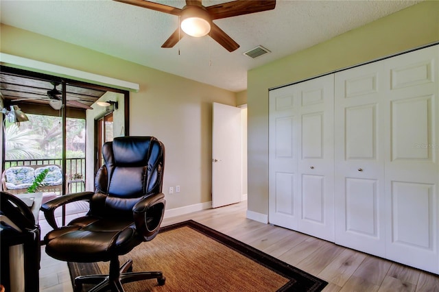 2913 Fig Ct, Palm Harbor, FL 34684 - office area featuring ceiling fan, light wood finished floors, and baseboards