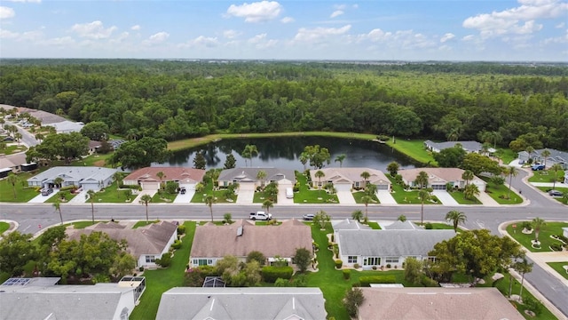 2015 W Del Webb Blvd, Sun City Center, FL 33573 - aerial view of property's location featuring a heavily wooded area, a large body of water, and nearby suburban area