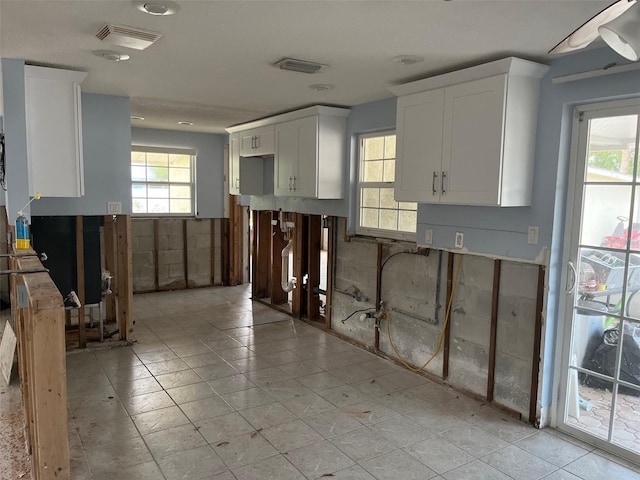 1500 Ohio Ave NE, Saint Petersburg, FL 33703 - kitchen featuring white cabinets