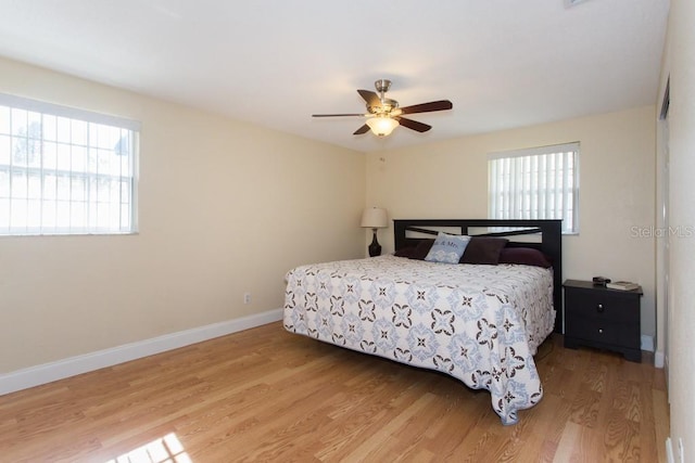 1500 Ohio Ave NE, Saint Petersburg, FL 33703 - bedroom featuring light wood finished floors, baseboards, and a ceiling fan