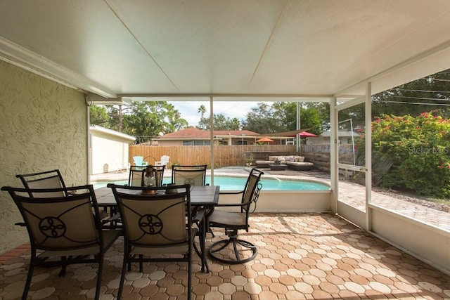 1500 Ohio Ave NE, Saint Petersburg, FL 33703 - sunroom with an outdoor hangout area and outdoor dining area