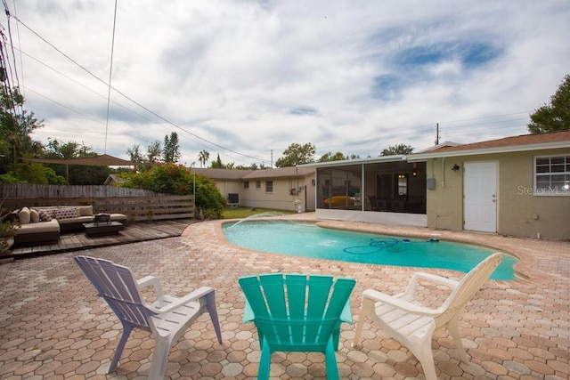 1500 Ohio Ave NE, Saint Petersburg, FL 33703 - view of pool with a sunroom, outdoor lounge area, a patio, and fence