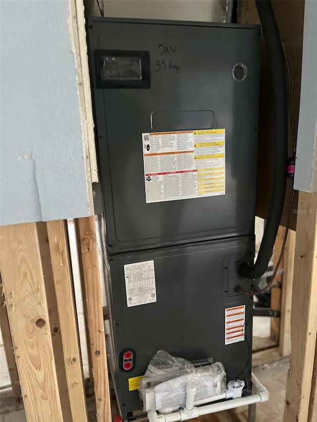 1500 Ohio Ave NE, Saint Petersburg, FL 33703 - utility room with heating unit