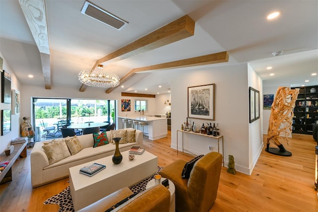 13916 Wellesford Way, Tampa, FL 33624 - living area featuring a chandelier, light wood finished floors, beamed ceiling, recessed lighting, and baseboards